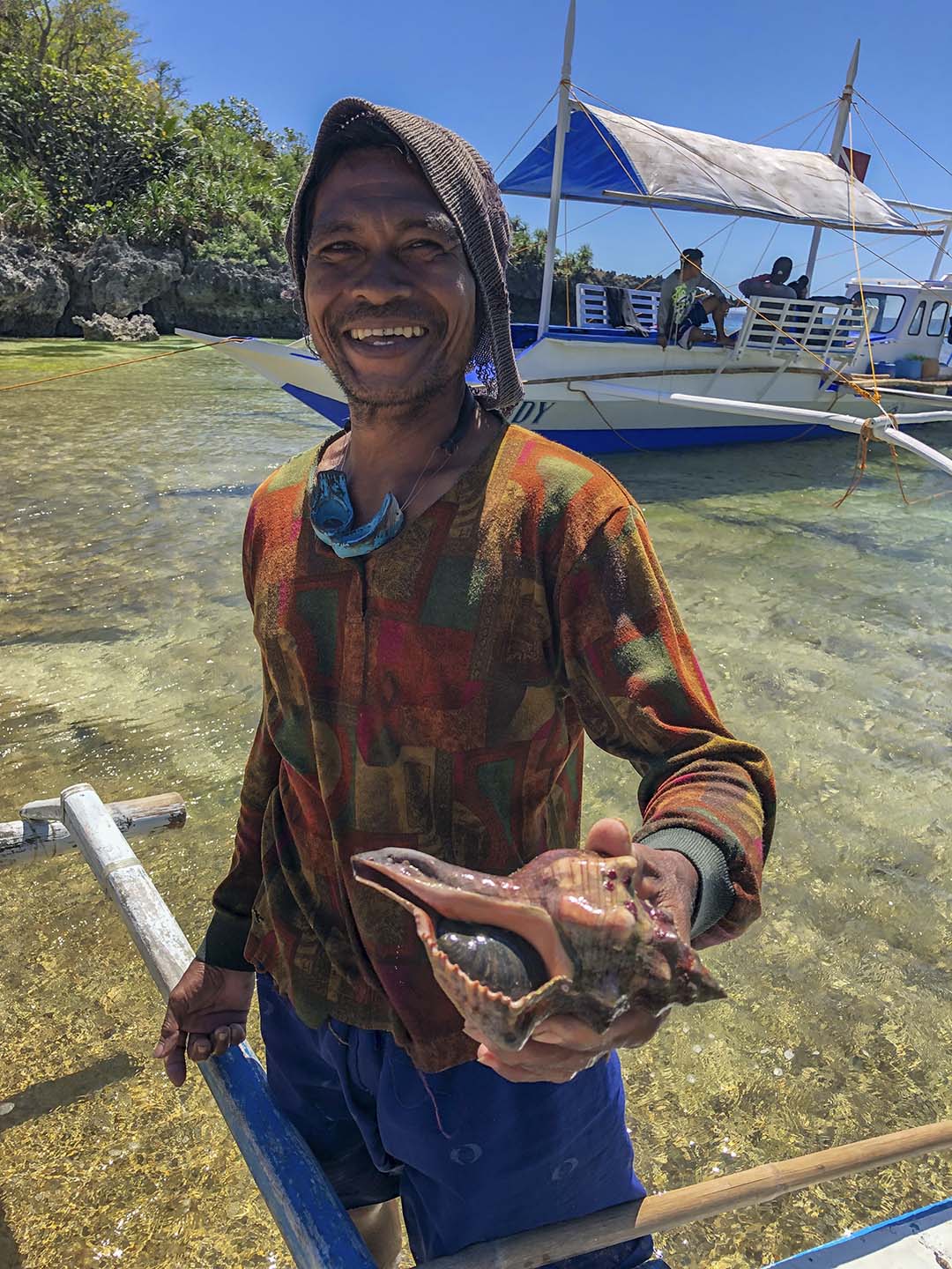 Caluya fisherman showing his catch