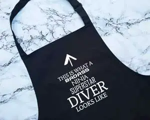 This Is What A Badass Diver Looks Like Apron by GiftedTurtlesUK
