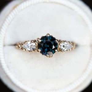 Handmade Ocean Jewelry: 13 Shops for Ocean Lovers 36 Ocean Engagement Ring for Divers: Round blue green sapphire barnacle ring by Oore