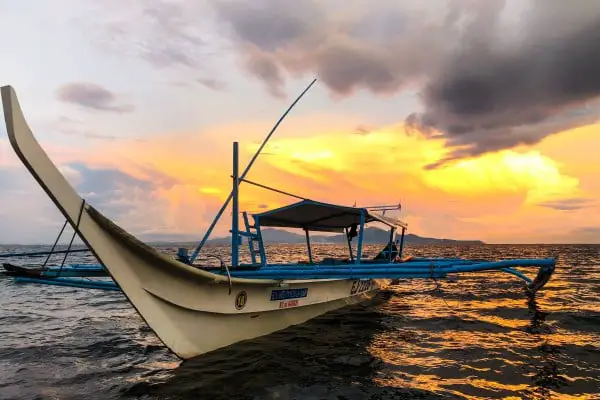 Layag Resort sunset with boat