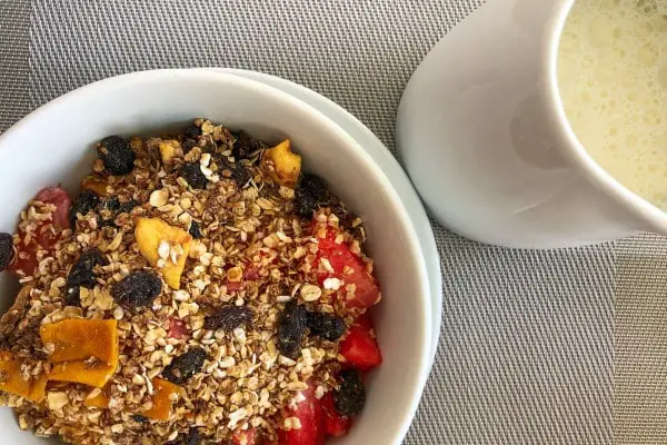 Phil's Breakfast Bowl: Muesli, fresh and dried fruits, cereal, and fresh milk