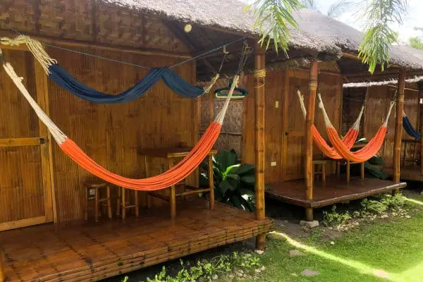 Hammocks outside each room in Aivy Maes Diver Resort