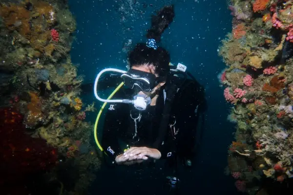scuba diver exploring okikawa wreck